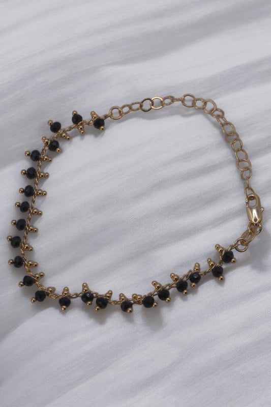 Pulsera de cuentas negras rellenas de oro de 18 k